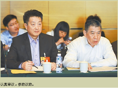 江西日报3月12日A03版.png